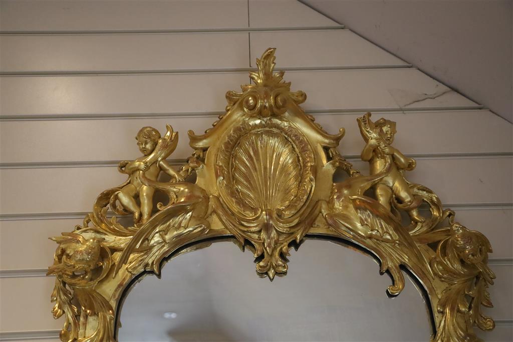 A pair of 19th century French carved giltwood wall mirrors, W.2ft 3in. H.5ft 1in.